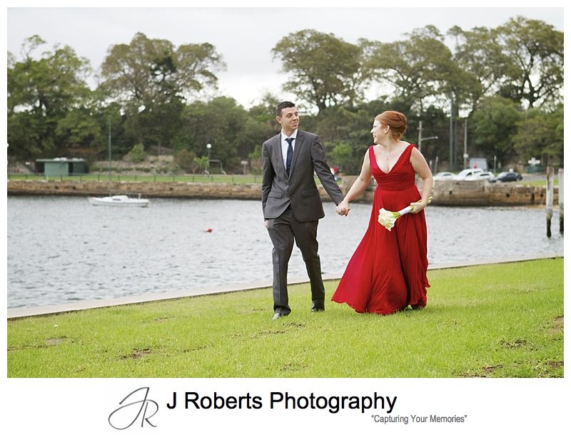Couple walking along blues point reserve - sydney wedding photography 